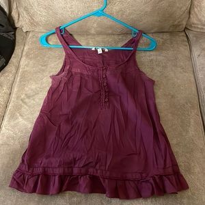Light weight buttoned tank top. Purple with maroon undertone.